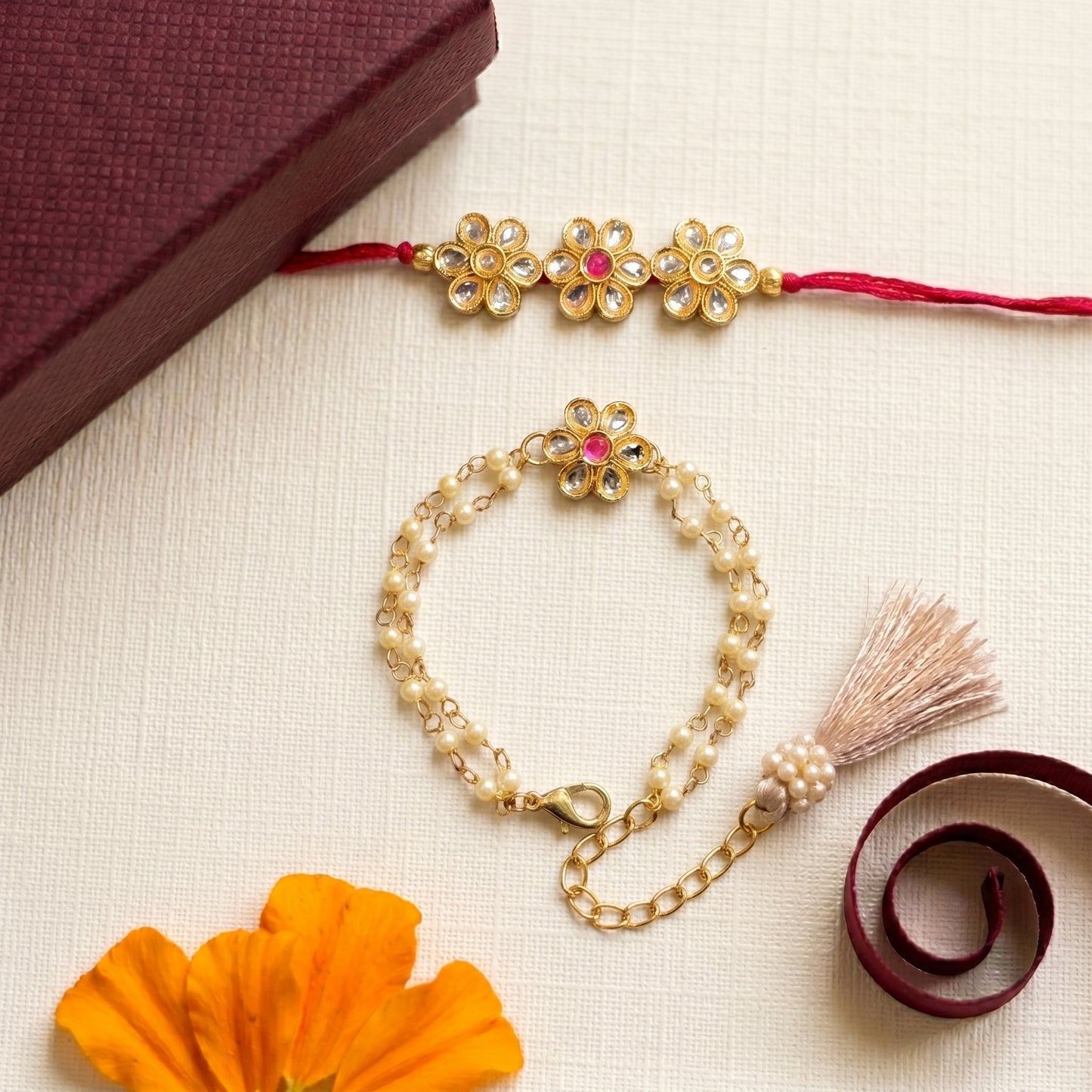 Royal Blossom Rakhi & Bracelet Set