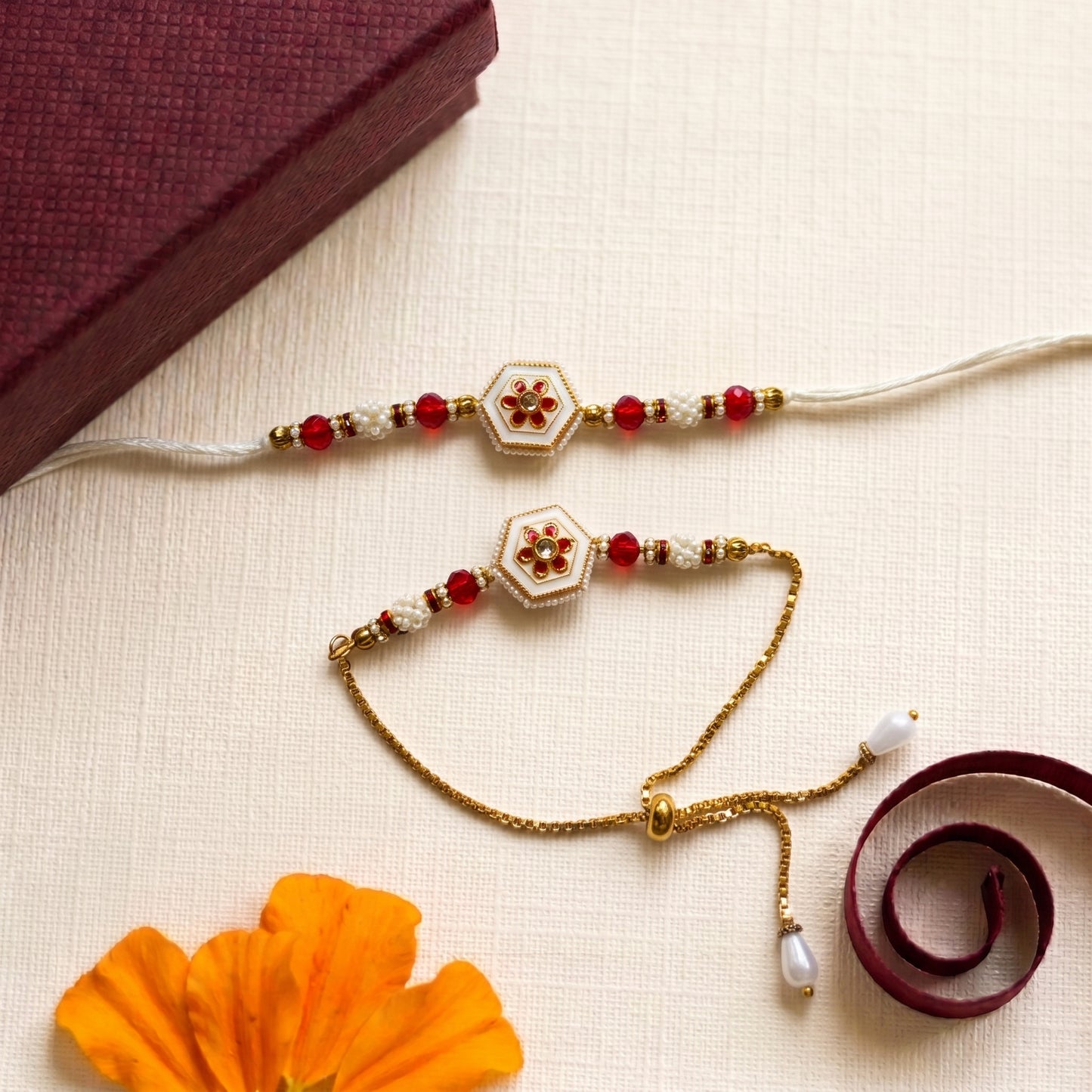 Elegant Floral Bhaiya Bhabhi Rakhi Combo | Pearl & Red Crystal Rakhi Bracelet Set