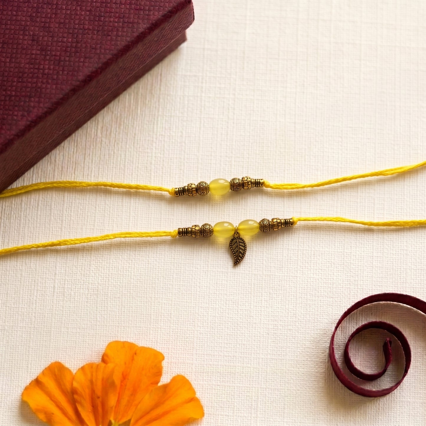Minimal Yellow Beaded Bhaiya Bhabhi Rakhi Combo | Handcrafted Rakhi & Leaf Charm Lumba Set