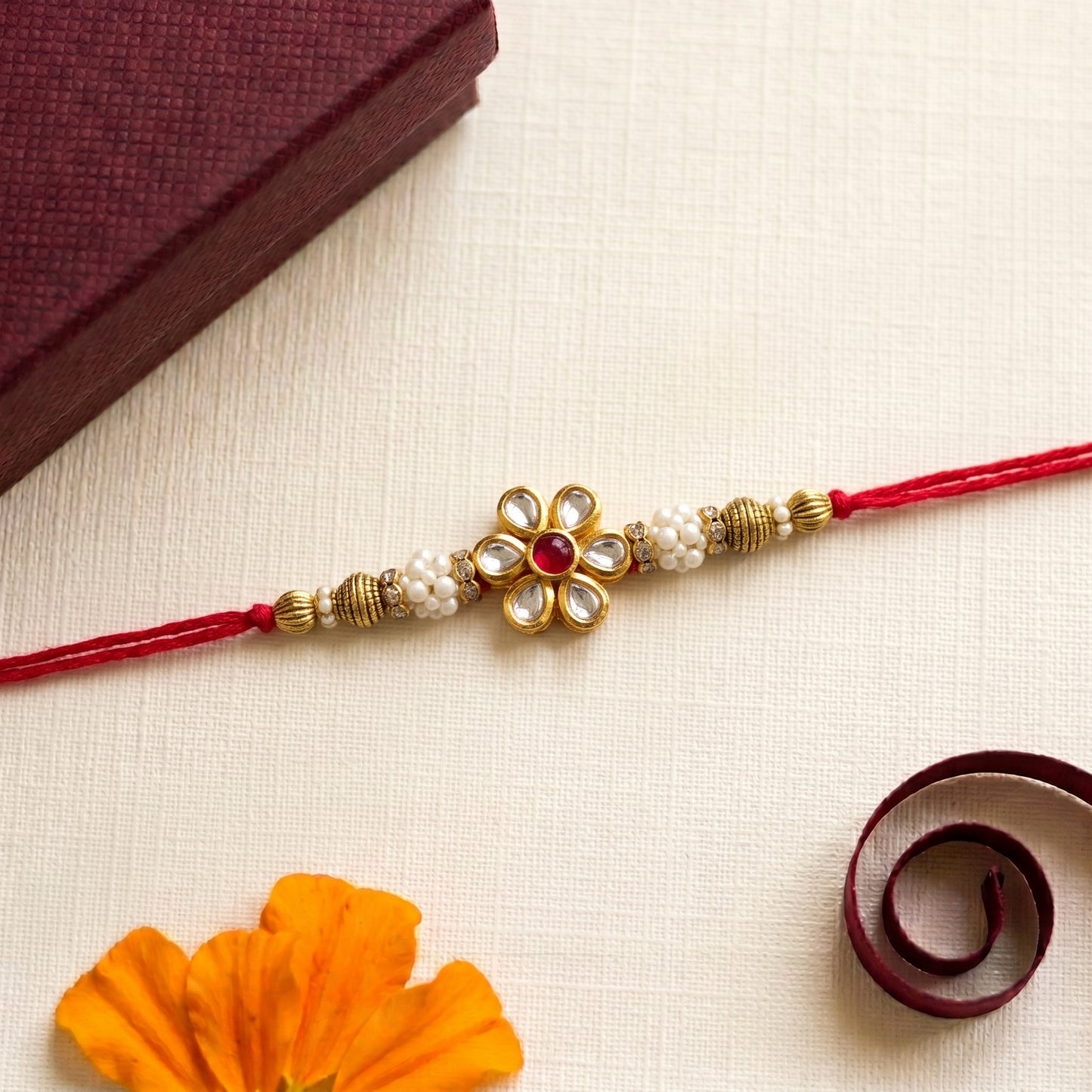 Elegant Floral Kundan Bhai Rakhi Collection